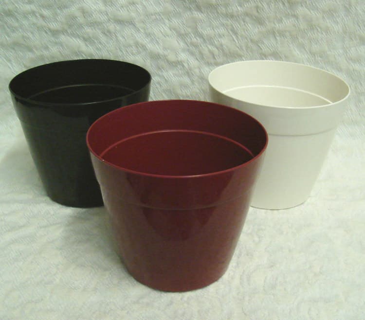4 5/8" W x 4" Tall Tapered Cylinder Plastic Vase  DISC