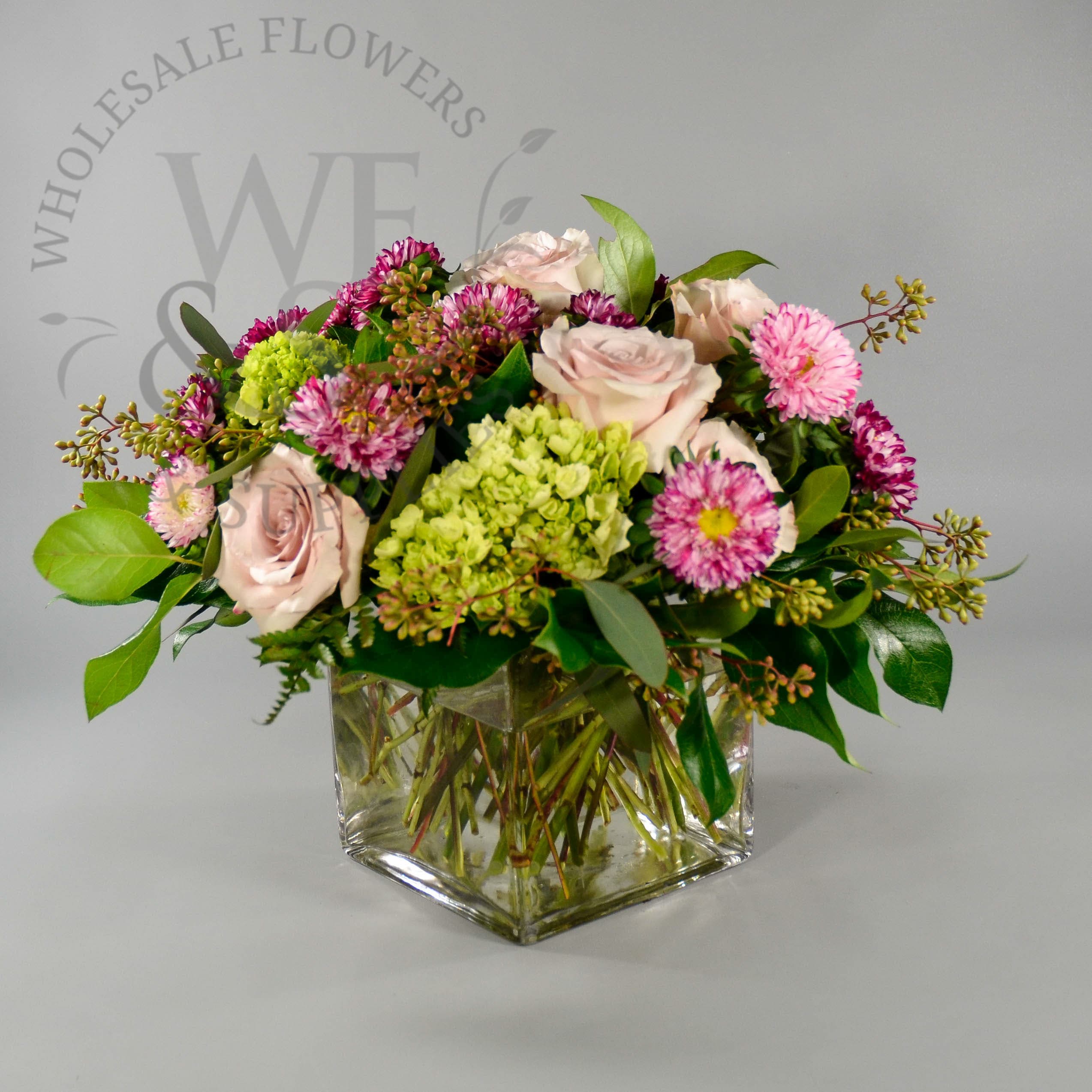 Roses, Aster, and Mini Green Hydrangeas.