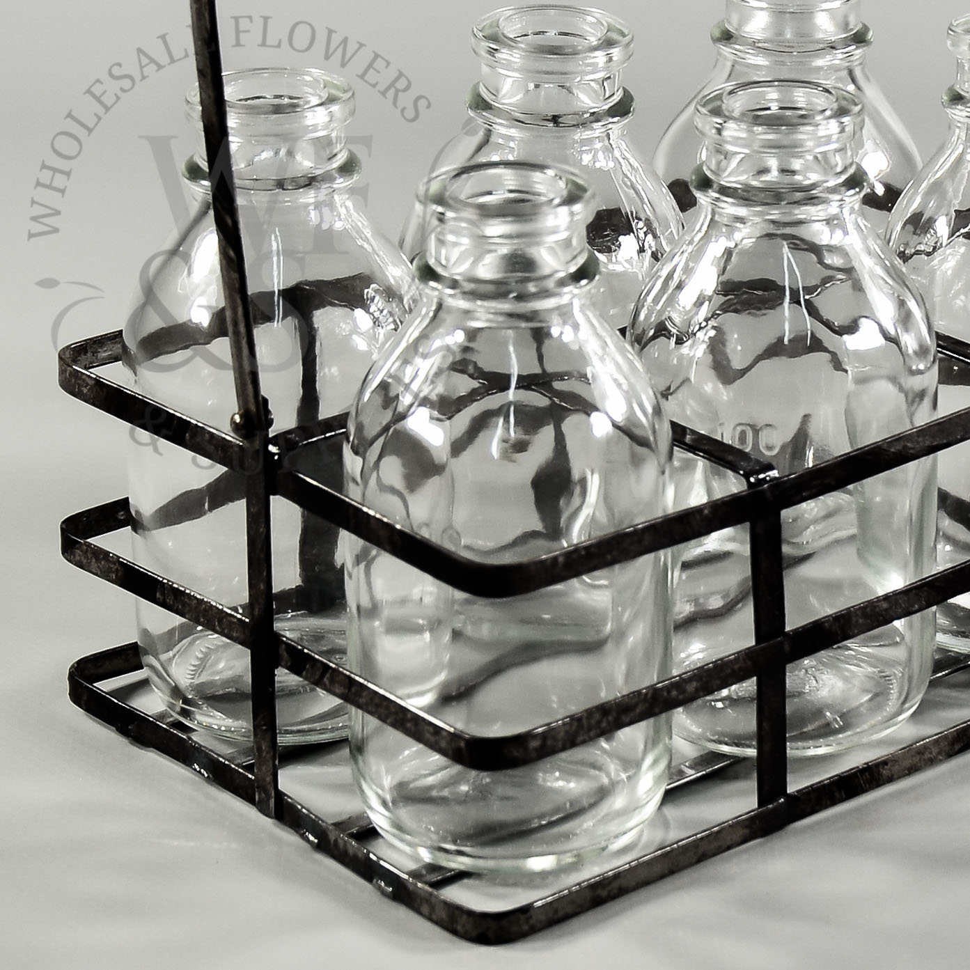 6 Glass Milk Bottles in Metal Carrier angle